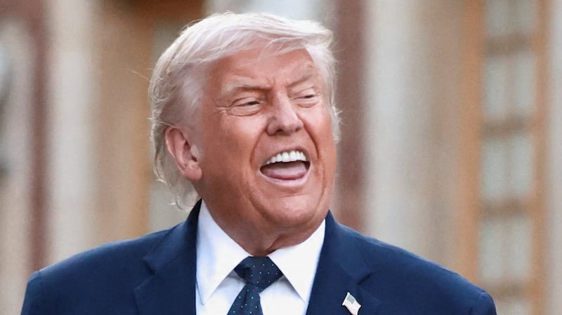 U.S. President Donald Trump is welcomed by French President Emmanuel Macron and his wife Brigitte Macron ahead of a dinner commemorating the 250th anniversary of the United States' independence, at the Palace of Versailles, near Paris, France, June 17, 2026.