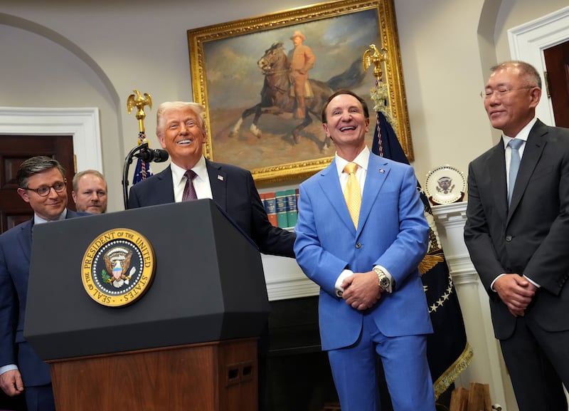 President Donald Trump speaks with Hyundai Chairman Euisun Chung (R), Louisiana Governor Jeff Landry (C), Speaker of the House Mike Johnson (R-LA) (L) and Ascension Parish President Clint Cointment in the Roosevelt Room of the White House March 24, 2025 in Washington, DC.