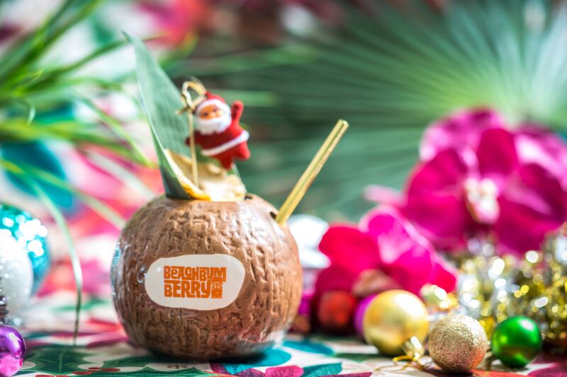 articles/2016/12/22/over-the-top-restaurant-and-bar-holiday-decorations/161222-Rothbaum-Sippin-Santa_t6cqbj