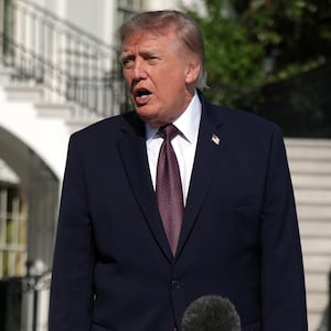 U.S. President Donald Trump speaks to members of the media prior to a South Lawn departure at the White House on October 2, 2026 in Washington, DC.