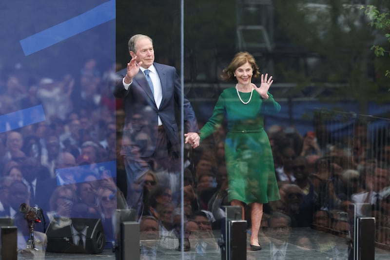 Former U.S. President George W. Bush and former First Lady Laura Bush attend a dedication ceremony for the opening of the Obama Presidential Center, in Chicago, Illinois, U.S., June 18, 2026. REUTERS/Brendan McDermid