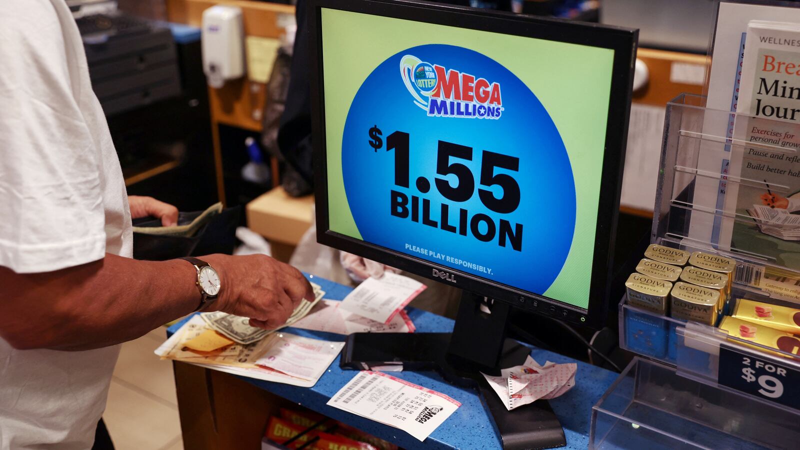 The display in a store shows the Mega Millions lottery jackpot at $1.55-billion in New York City, U.S., August 8, 2023.