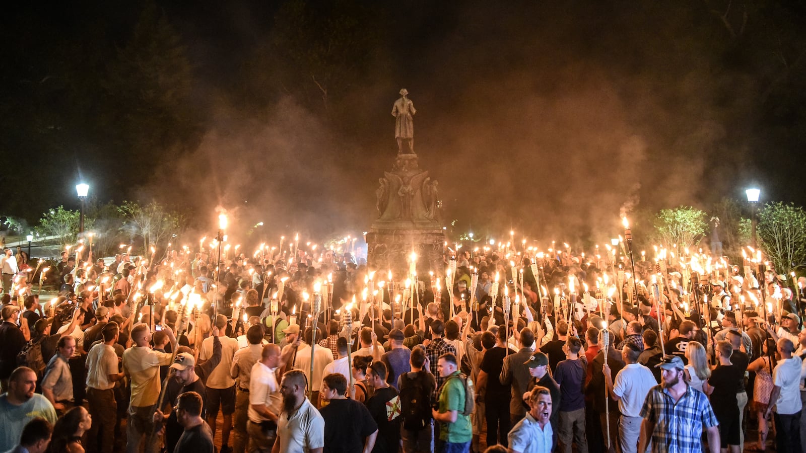 White nationalists participate in a torch-lit march on the grounds of the University of Virginia ahead of the Unite the Right Rally in Charlottesville, Virginia on August 11, 2017.