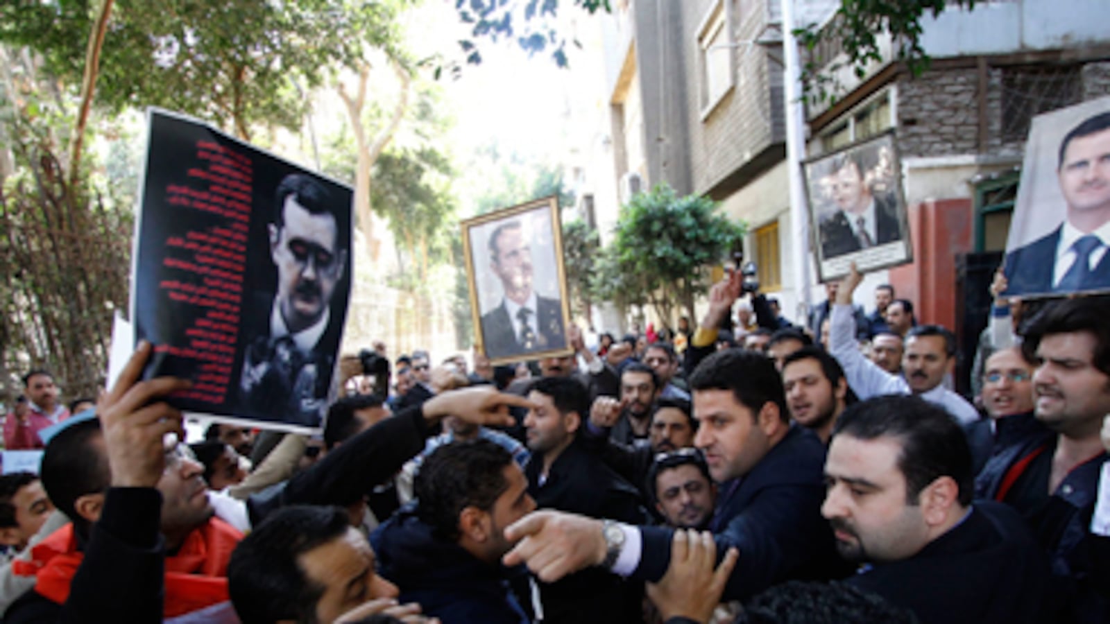 articles/2011/03/17/syrian-protesters-attacked-by-regime-thugs-in-cairo-thx/giglio-syrian-protest_167210_kdzvtx