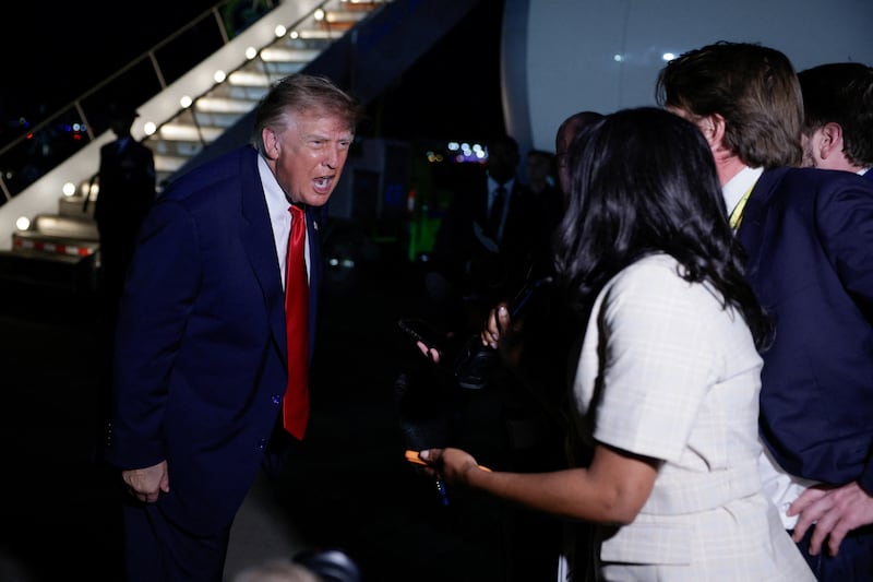 U.S. President Donald Trump speaks to members of the press before boarding Air Force One at Dallas Fort Worth International Airport in Dallas, Texas, U.S., September 10, 2026.