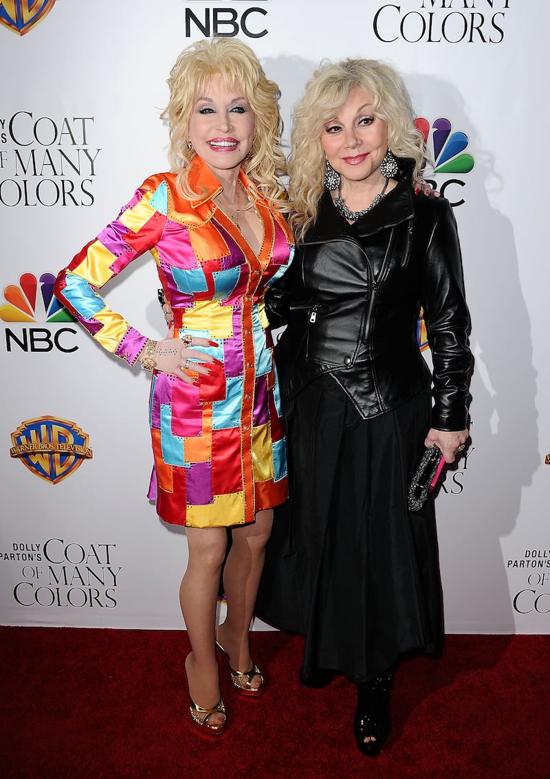 HOLLYWOOD, CA - DECEMBER 02: Dolly Parton and Stella Parton attend the premiere of "Dolly Parton's Coat Of Many Colors" at the Egyptian Theatre on December 2, 2015 in Hollywood, California. (Photo by Jason LaVeris/FilmMagic)