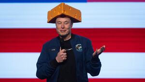 Musk arrived to a Green Bay town hall wearing a cheesehead hat.