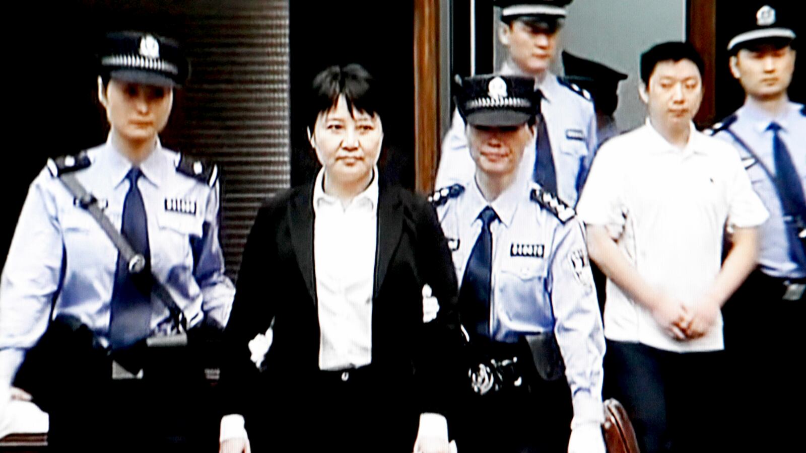 articles/2012/08/20/gu-kailai-gets-suspended-death-sentence/gu-kailai-verdict-liu_rmfzoi