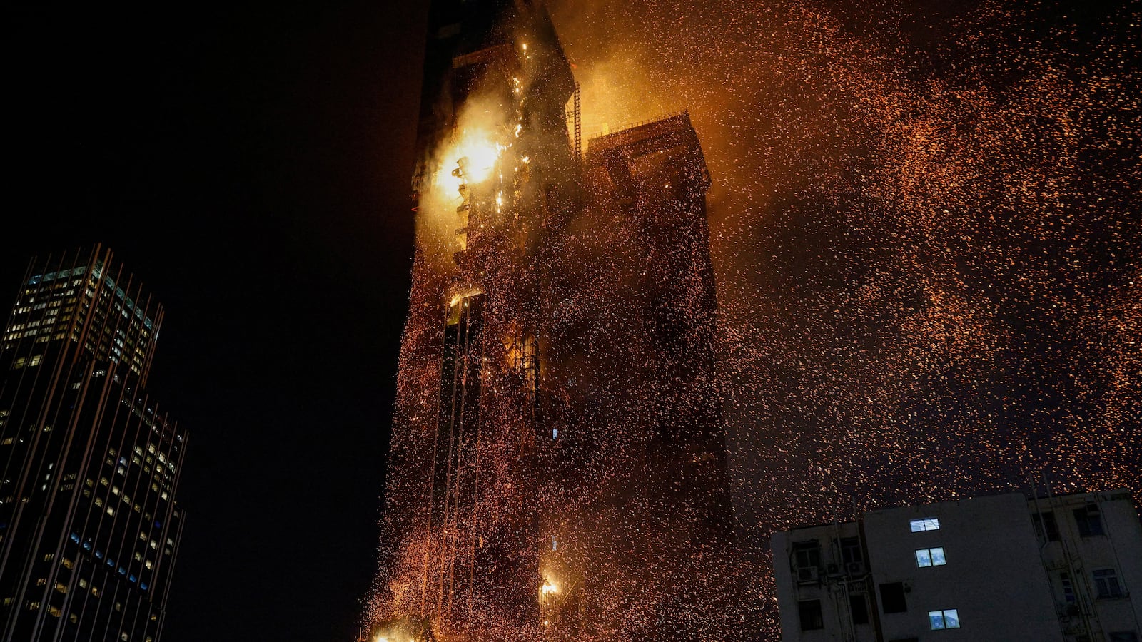 A building is seen on fire in Hong Kong, China March 3, 2023.