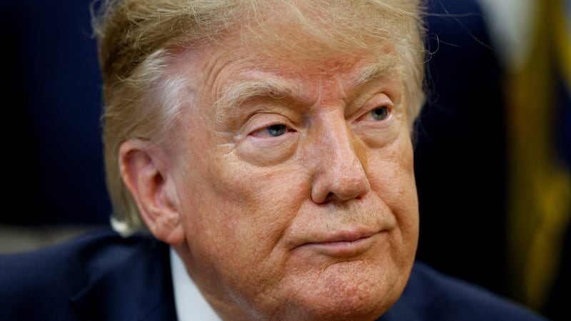 Donald Trump talks to reporters after announcing he's banning CNN, Politico and MSNOW from the White House.