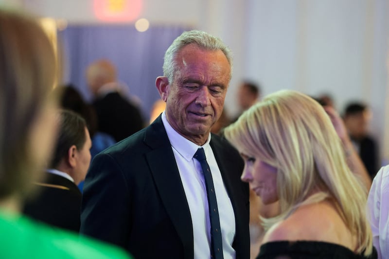 Robert F. Kennedy Jr. and wife Cheryl Hines attend the WHCA Dinner.