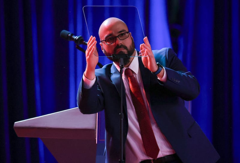 Gabriel Perez checks a teleprompter before Republican presidential nominee and former President Donald Trump arrives to speak following early results from the 2024 U.S. presidential election in Palm Beach County Convention Center, in West Palm Beach, Florida on November 6, 2024.