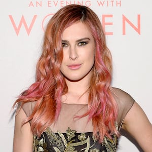 Actress Rumer Willis arrives for the L.A. Gay & Lesbian Center’s Annual “An Evening With Women” with rose colored hair and a side part in 2024.