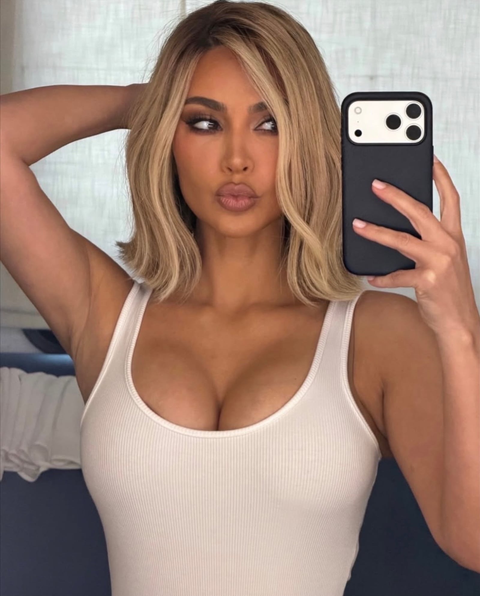 Kim Kardashian with a honey-blond lob.