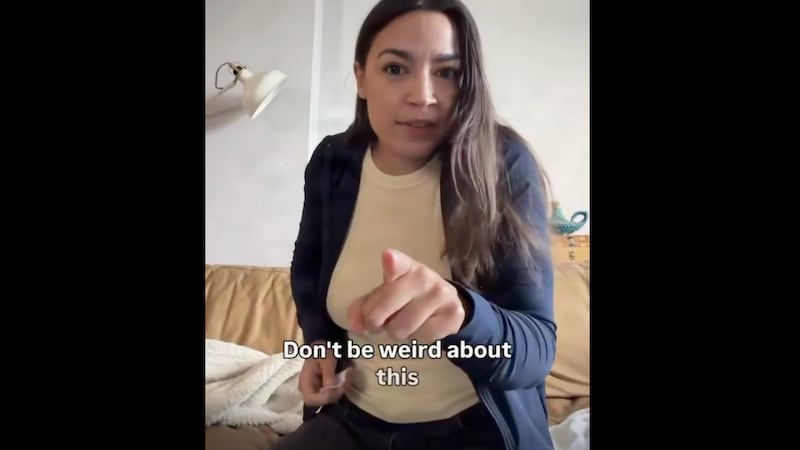Alexandria Ocasio-Cortez taking an injection.
