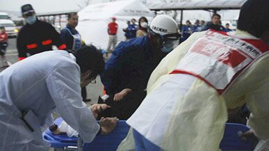 articles/2011/03/20/japan-nuclear-reactor-stabilized-and-woman-found-alive-after-nine-days/samuels-japan-hope_167856_yfkr4k