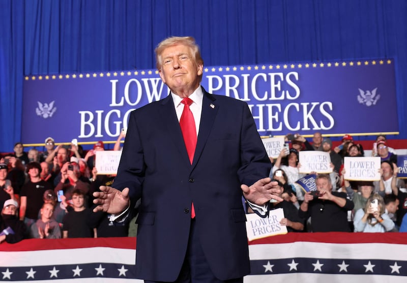 U.S. President Donald Trump gestures on the day he delivers a speech on energy and the economy, in Clive, Iowa, U.S., January 27, 2026. REUTERS/Kevin Lamarque
