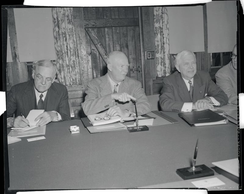 Camp David, Maryland. A serious faced President Eisenhower makes a point as he poses just before meeting with his cabinet here .