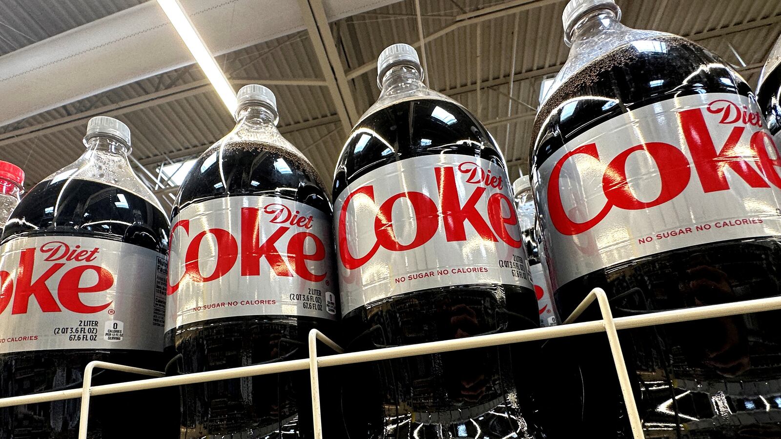 Bottles of Diet Coke which use Aspartame, an artificial sweetener set to be listed as a possible cancer risk by WHO.