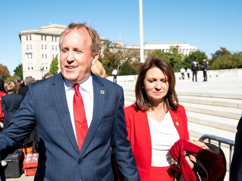 UNITED STATES - NOVEMBER 1: Texas Attorney General Ken Paxton and his wife Angela leave after speaking to pro-life activists outside the Supreme Court after the court heard two challenges to Texass new abortion law on Monday, Nov. 1, 2021. (Photo by Bill Clark/CQ-Roll Call, Inc via Getty Images)