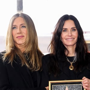 Actors Jennifer Aniston and Courteney Cox pose during her star unveiling ceremony on the Hollywood Walk of Fame in Los Angeles, California, U.S., February 27, 2023. REUTERS/Mario Anzuoni