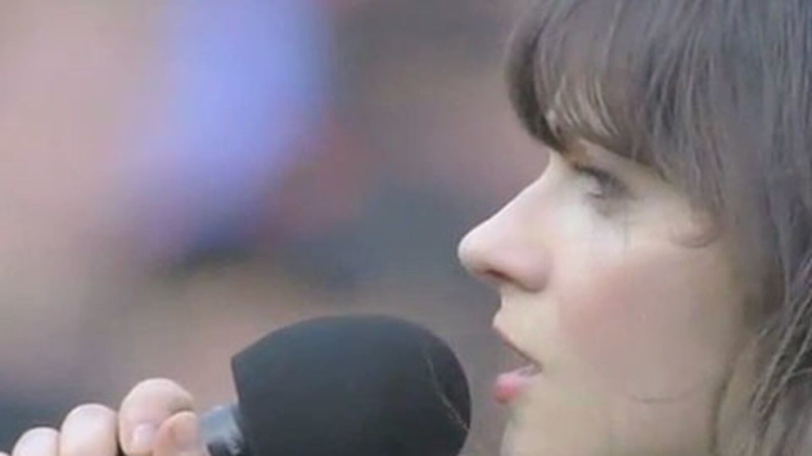 videos/2010/10/20/zooey-deschanel-sings-god-bless-america-at-philliesgiants-game/fox-zooey-deschanel-sing-120_yvlf4q