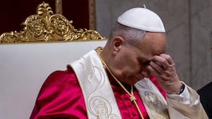 Pope Leo sitting down.
