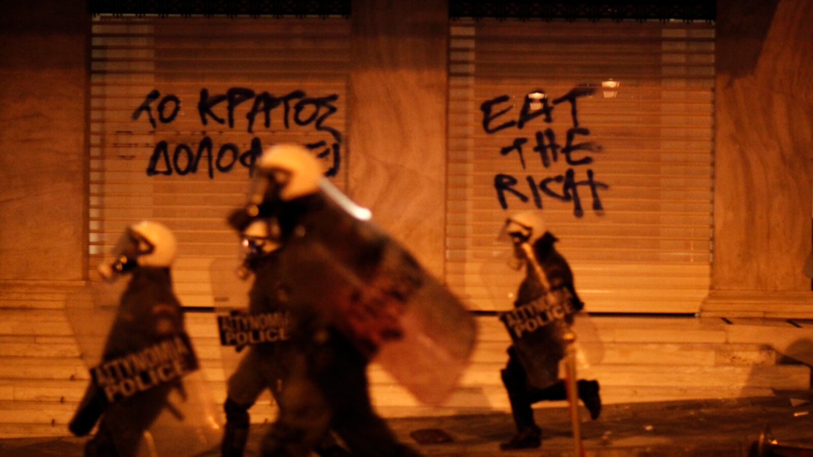 cheats/2012/04/05/greek-pensioner-suicide-prompts-protest/greece-protesters-clash-with-police-over-suicide-cheat_yg6rod