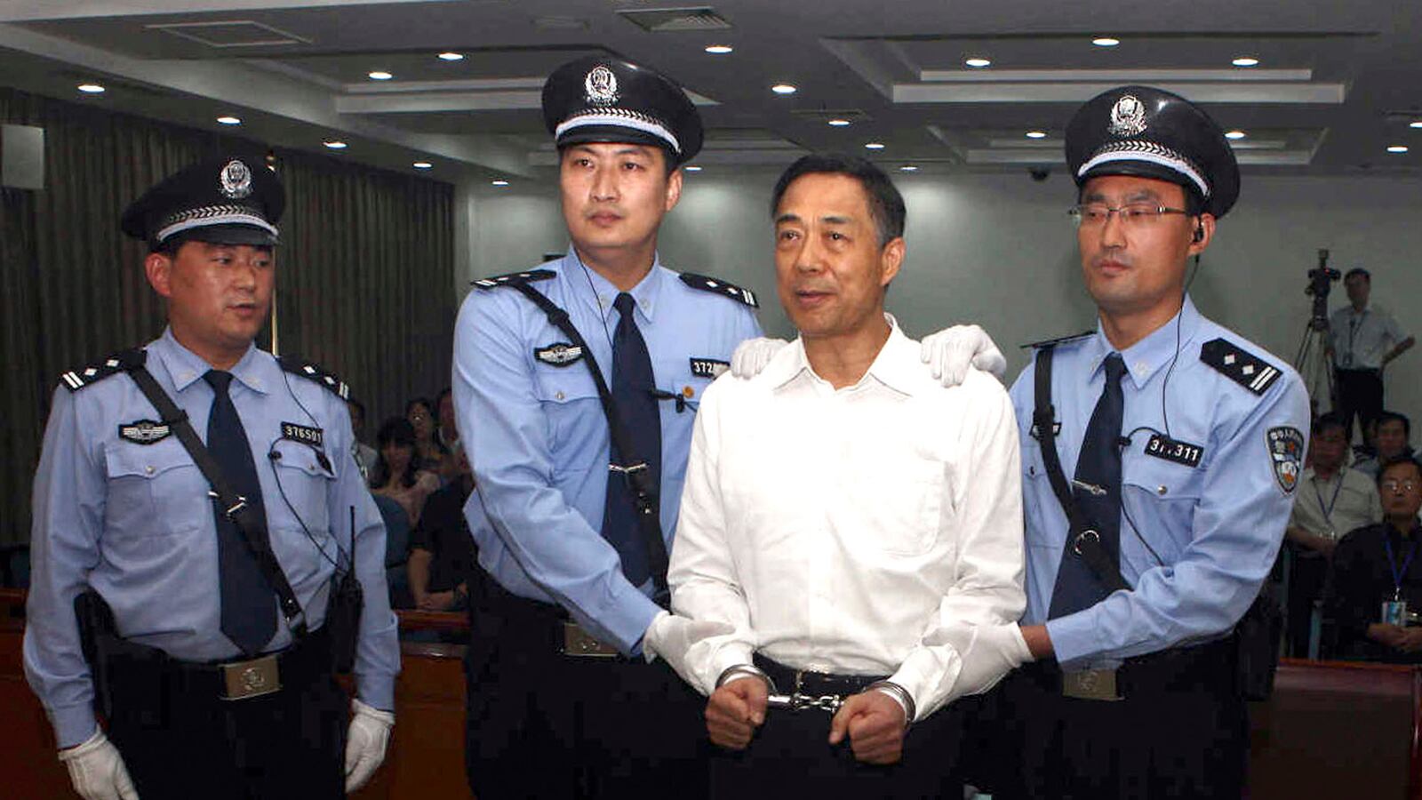 cheats/2013/09/22/bo-xilai-found-guilty/130922-Bo-Xilai-guilty-cheat_h5gtas