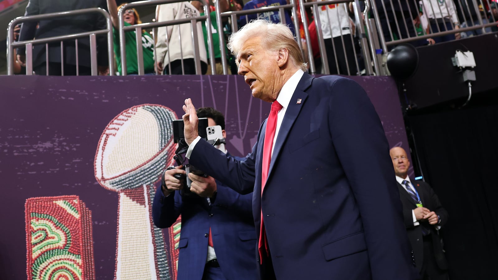 Donald Trump walks onto the field prior to Super Bowl LIX between the Kansas City Chiefs and the Philadelphia Eagles at Caesars Superdome on February 09, 2025 in New Orleans, Louisiana.