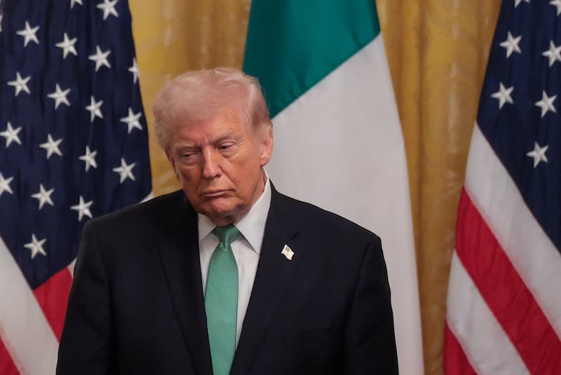 U.S. President Donald Trump attends a St. Patrick's Day reception, during Irish Taoiseach (Prime Minister) Micheal Martin's visit, in the East Room at the White House in Washington, D.C., U.S. March 17, 2026.