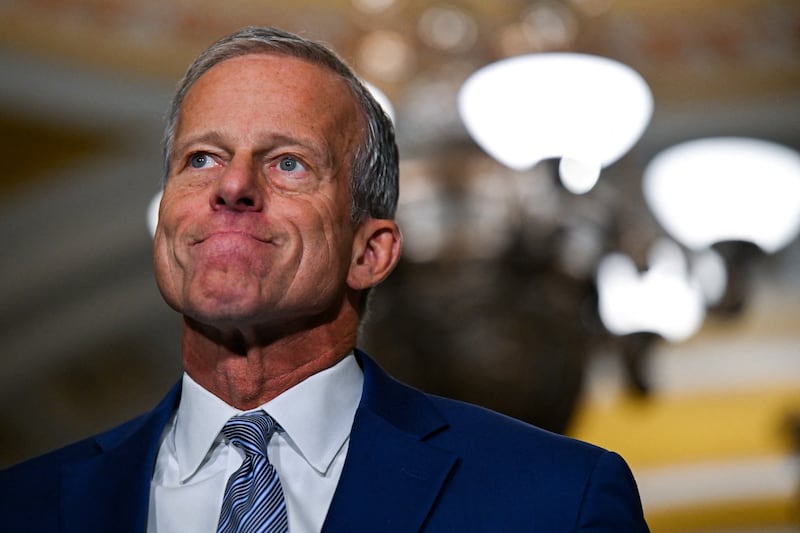 U.S. Senate Majority Leader John Thune (R-SD) reacts