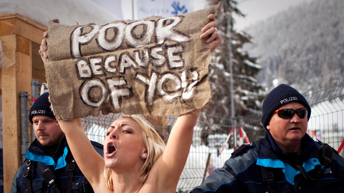 cheats/2012/01/28/topless-protesters-arrested-at-davos/davos-topless-protest-cheat_zhjsoo