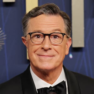 Stephen Colbert and Evelyn McGee-Colbert pose on the red carpet at the 77th Primetime Emmy Awards in Los Angeles, California, U.S., September 14, 2025.