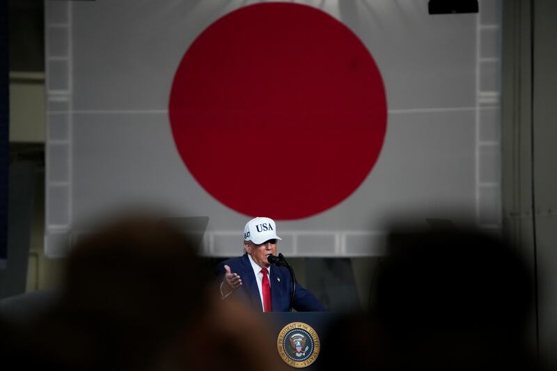 President Donald Trump speaks to troops aboard USS George Washington at Fleet Activities Yokosuka on October 28, 2025 in Yokosuka, Japan.