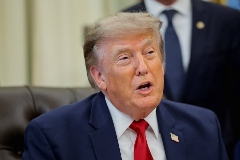 U.S. President Donald Trump speaks during an event to sign an executive order related to Utah protected lands, in the Oval Office at the White House in Washington, D.C., U.S., July 13, 2026.