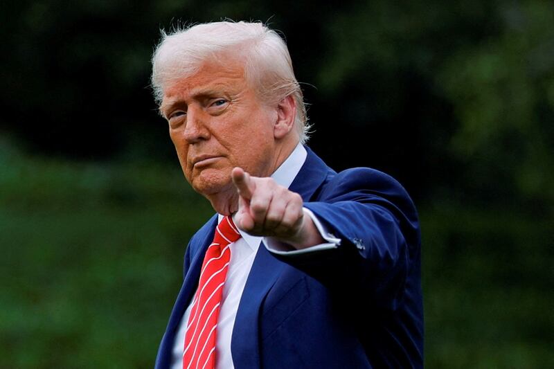 FILE PHOTO: U.S. President Donald Trump gestures, as he departs for Pennsylvania, on the South Lawn of the White House in Washington, D.C., U.S., May 30, 2025. REUTERS/Kent Nishimura/File Photo