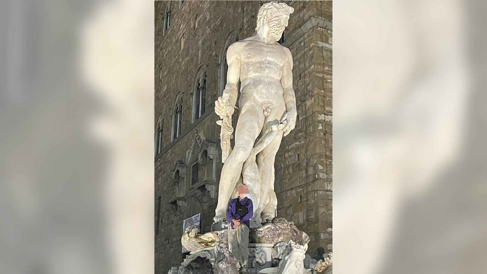German tourist climbs Neptune statue for selfie.