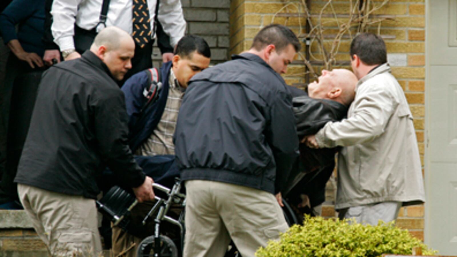 cheats/2009/04/14/demjanjuk-deportation-halted/john-demjanjuk-wheelchair-carry_qc5iva