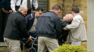 cheats/2009/04/14/demjanjuk-deportation-halted/john-demjanjuk-wheelchair-carry_qc5iva