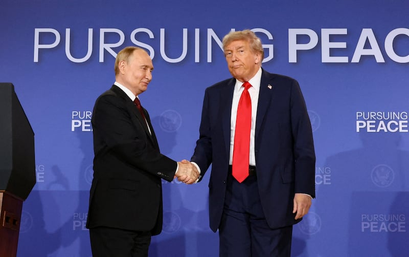 U.S. President Donald Trump and Russian President Vladimir Putin shake hands during a press conference following their meeting to negotiate an end to the war in Ukraine, at Joint Base Elmendorf-Richardson, in Anchorage, Alaska, U.S., August 15, 2025.
