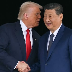 US President Donald Trump (L) and China's President Xi