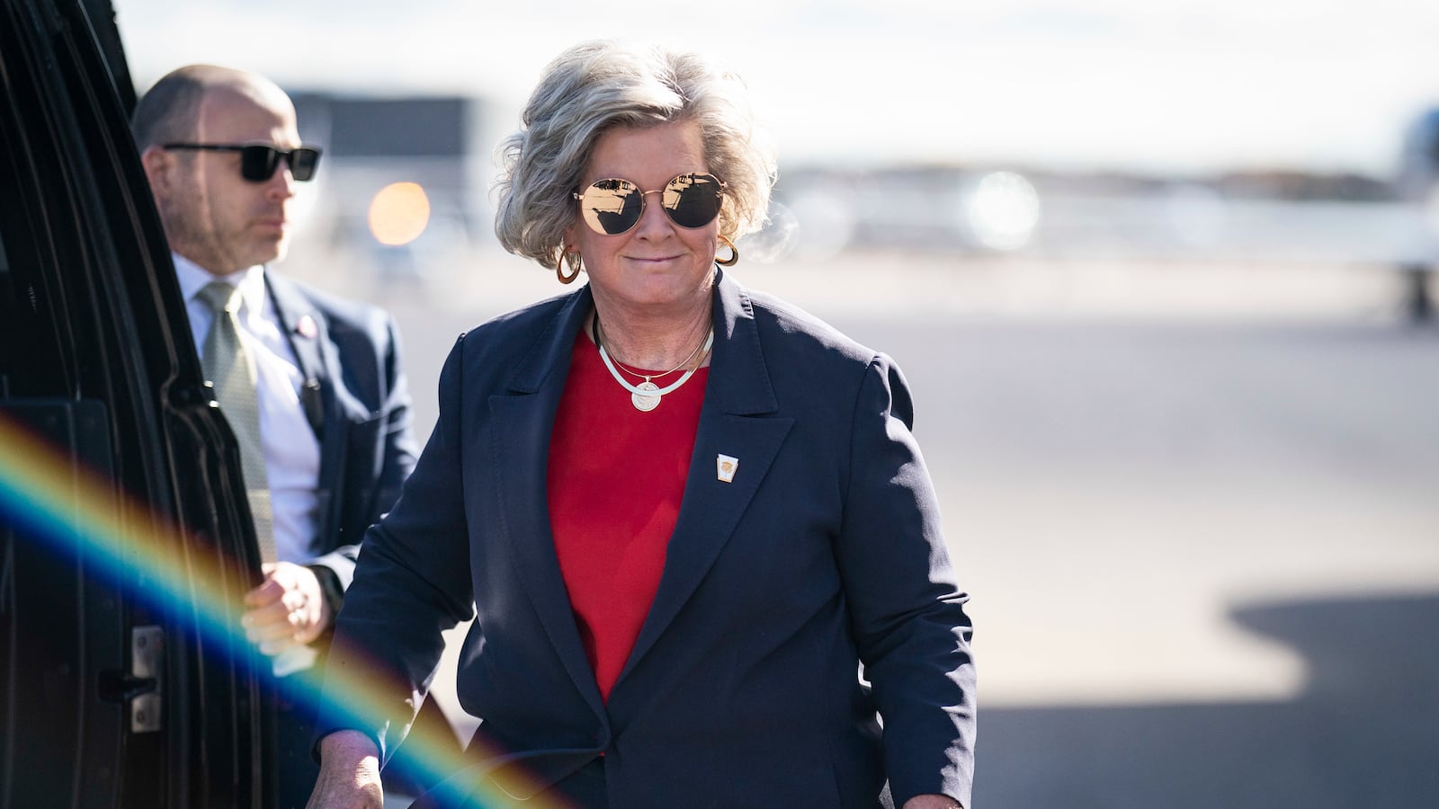 Susie Wiles and Former President Donald Trump disembark his plane known as Trump Force One at Manchester-Boston Regional Airport on Monday, Oct. 23, 2023, in Londonderry, New Hampshire.