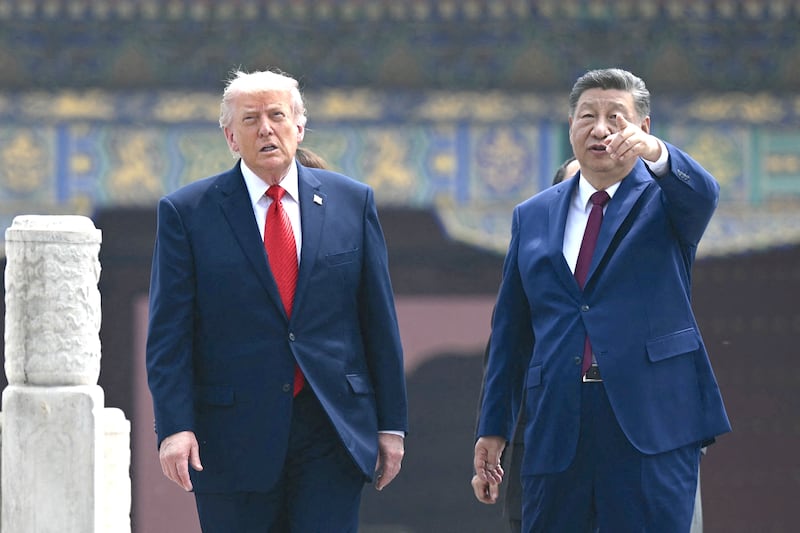 China's President Xi Jinping and US President Donald Trump visit the Temple of Heaven in Beijing on May 14, 2026.