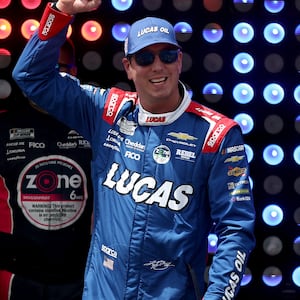 Kyle Busch, driver of the #8 Lucas Oil Chevrolet, walks onstage during driver intros prior to the NASCAR Cup Series All-Star Race at Dover Motor Speedway on May 17, 2026 in Dover, Delaware.