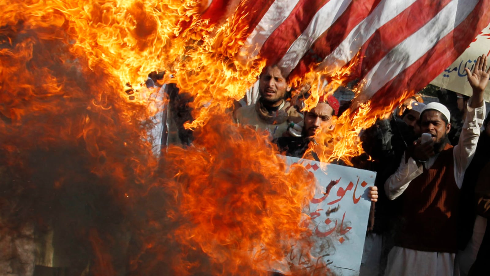 articles/2012/02/28/u-s-must-show-it-respects-quran-and-its-importance-to-afghans/quran-burning-dyk_afp6t5