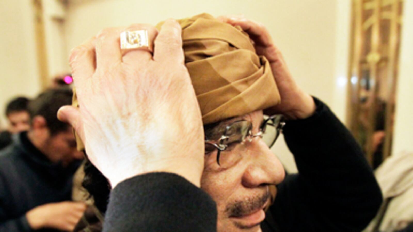cheats/2011/05/27/russia-time-for-gaddafi-to-go/gaddafi-buckles_lzkyo1