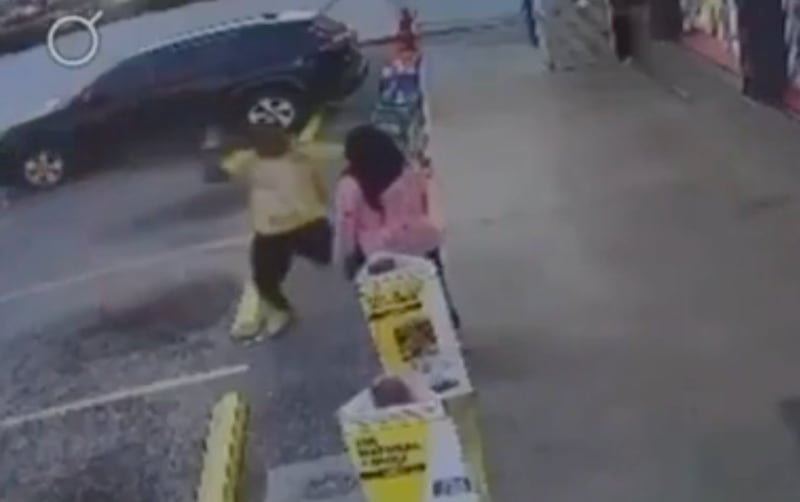 Man strikes store worker with a hammer