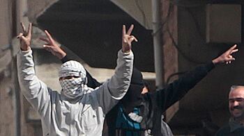 cheats/2011/03/24/20000-syrian-line-streets-for-funerals/protests-in-daraa_remnja