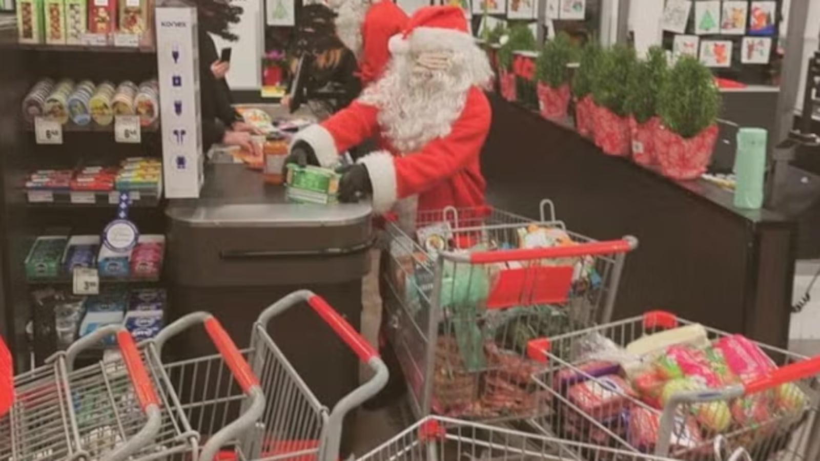 Gang of Santa's Rob Grocery Stores to Give Food to the Needy